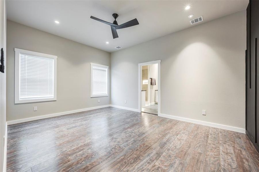 Unfurnished bedroom featuring wood finished floors, recessed lighting, and ceiling fan