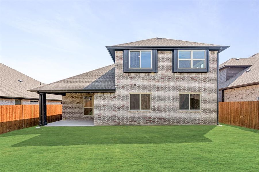 Front exterior of a new home in Country Lakes Classic 50, Denton, TX, highlighting curb appeal (Image 1).