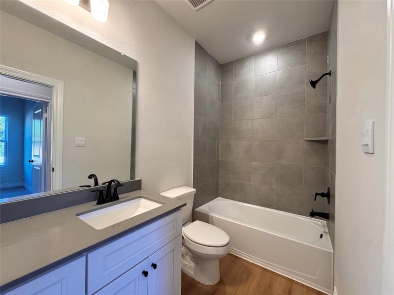 Tile to the ceiling! Undermount sinks and quartz countertops for extra durability! Tile to the ceiling! Undermount sinks and quartz countertops for extra durability!