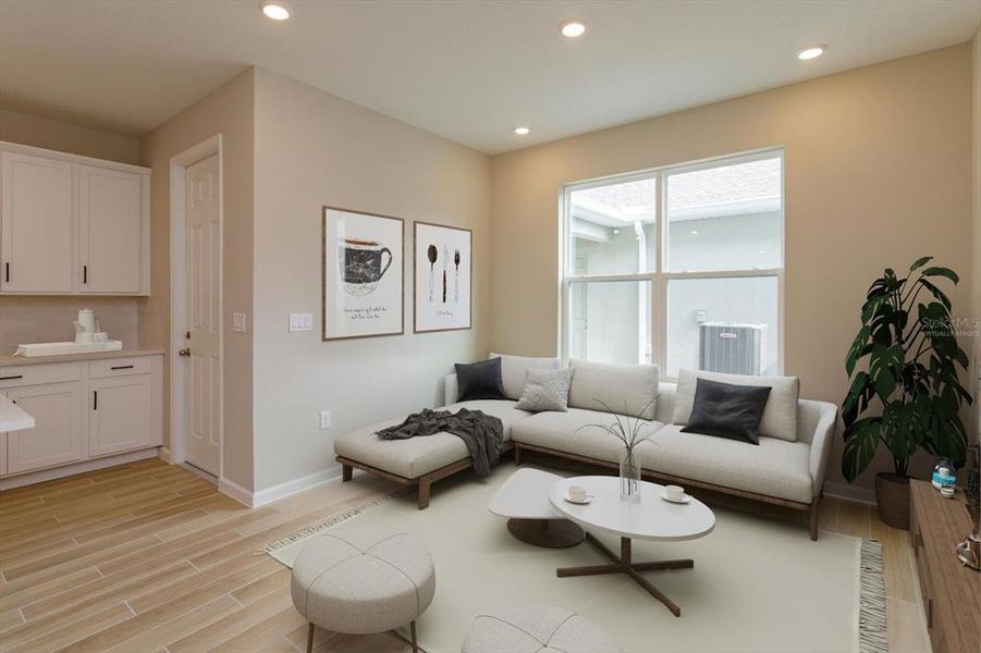 Furnished interior view inside a new home in Serenade at Ovation, Winter Garden (Image 15).