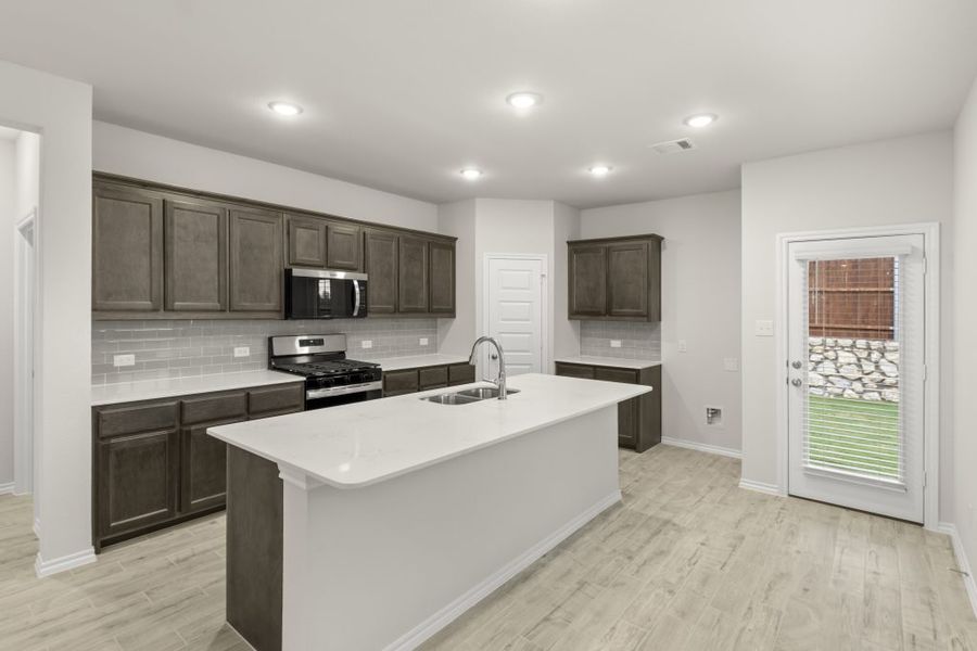 Representative exterior photo of a completed home built from the Willow by Impression Homes in Northspur, Terrell, TX (Image 8). Representative exterior photo of a completed home built from the Willow by Impression Homes in Northspur, Terrell, TX (Image 8).