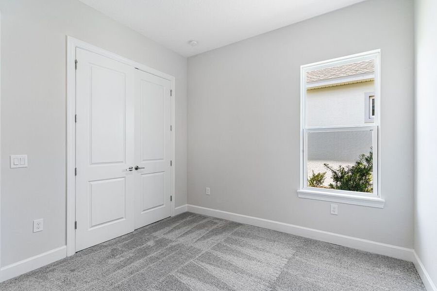 Representative unfurnished interior of a home built from the Letizia by Taylor Morrison in Esplanade at Center Lake Ranch, St. Cloud (Image 24).