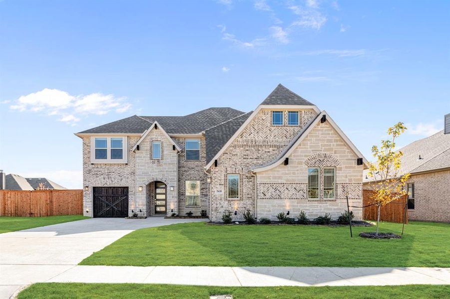Front exterior of a new home in Hayes Crossing, Midlothian, TX, highlighting curb appeal (Image 2).