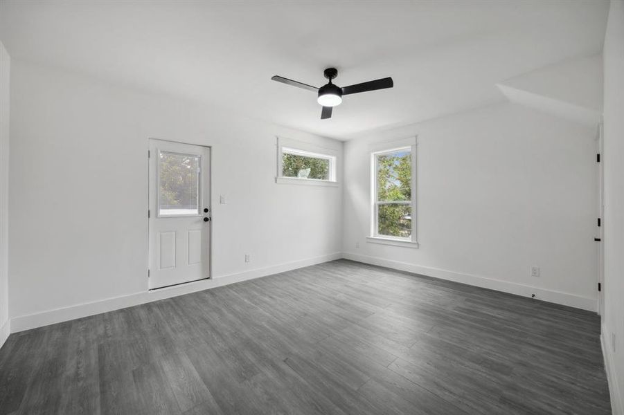 2nd floor bedroom room with vaulted ceiling, and ceiling fan