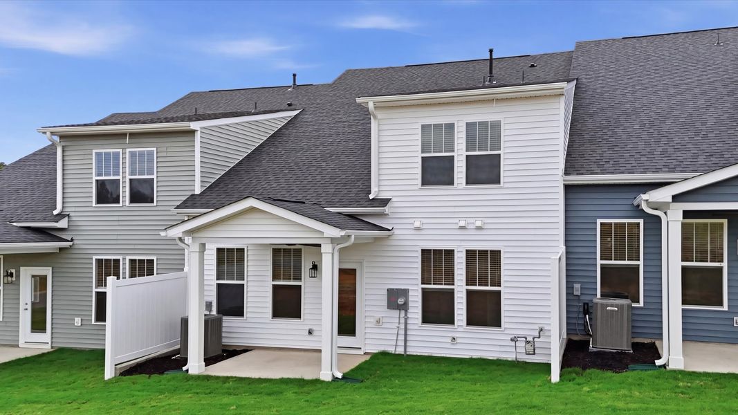 Accomplished exterior with a spacious rear porch that blends comfort and style at Silo Ridge Accomplished exterior with a spacious rear porch that blends comfort and style at Silo Ridge