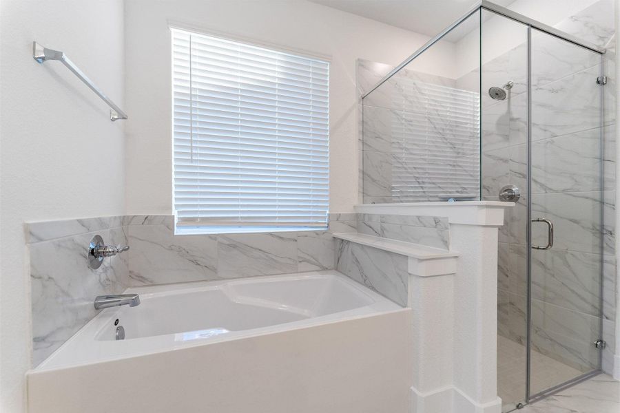 Furnished interior view inside a new home in Sunterra, Katy (Image 2).