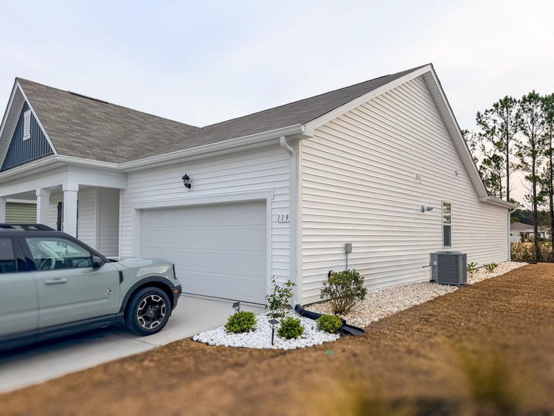 Exterior details and patio area of a home in , Longs (Image 28).