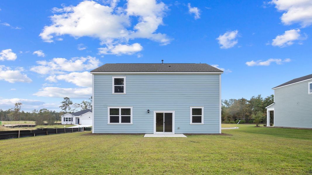Front exterior of a new home in Fernhill Farms, Statesboro, GA, highlighting curb appeal (Image 22).