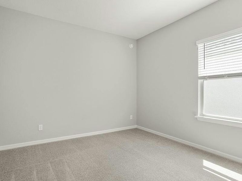 Secondary bedrooms provide space for everyone in your household.