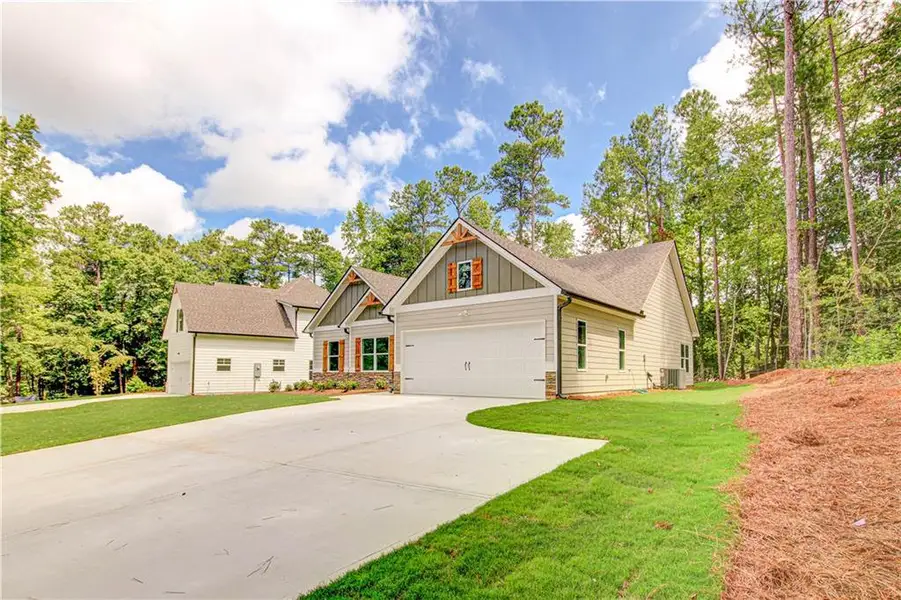 Front exterior of a new home in , Villa Rica, GA, highlighting curb appeal (Image 21).