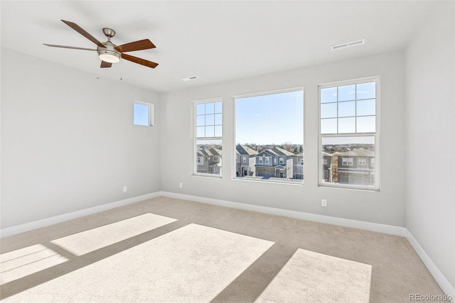 Spacious, unfurnished interior of a new home in Trailside at Cottonwood Creek, Colorado Springs (Image 24).