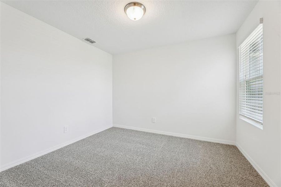 Spacious, unfurnished interior of a new home in The Meadow at Crossprairie Townes, St. Cloud (Image 29).