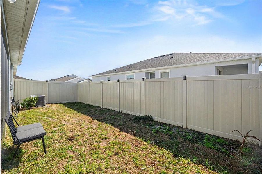 Exterior details and patio area of a home in Woodcreek, Wesley Chapel (Image 22).