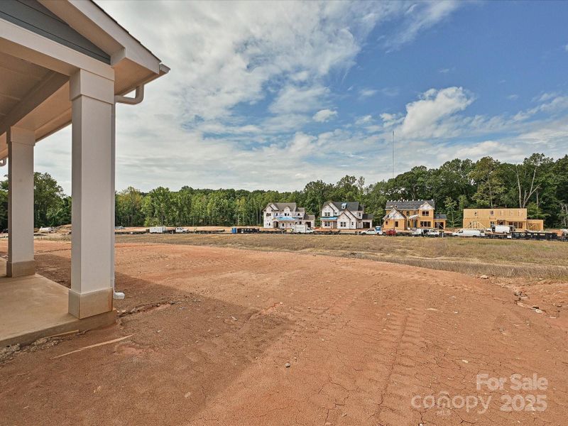 Front exterior of a new home in Coventry Glen, Huntersville, NC, highlighting curb appeal (Image 23). Front exterior of a new home in Coventry Glen, Huntersville, NC, highlighting curb appeal (Image 23).