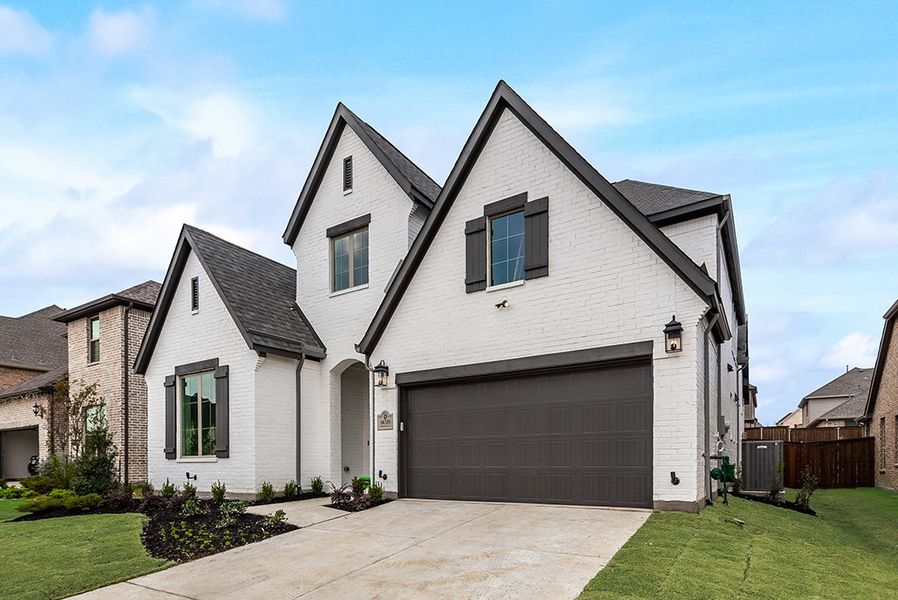 Representative exterior photo of a completed home built from the Anson - SH 4437 by Shaddock Homes in Grand Oaks at Green Meadows - 50', Celina, TX (Image 23). Representative exterior photo of a completed home built from the Anson - SH 4437 by Shaddock Homes in Grand Oaks at Green Meadows - 50', Celina, TX (Image 23).