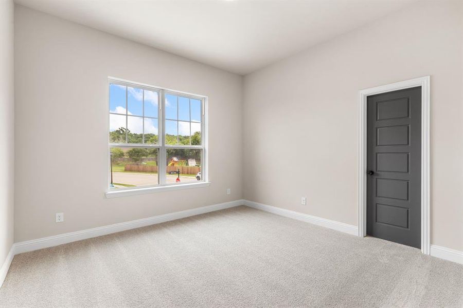 Empty room with light carpet