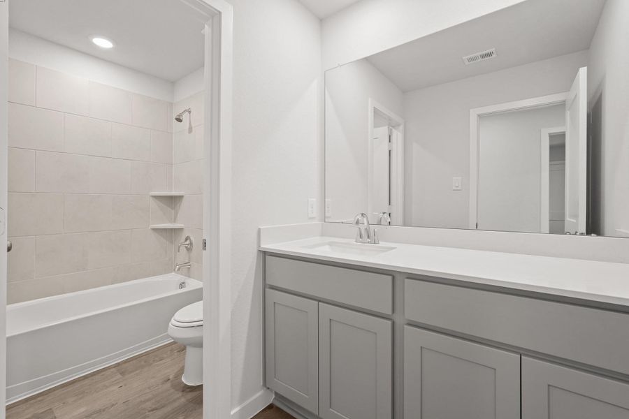 Furnished interior view inside a new home in Lakes at Black Oak, Magnolia (Image 10). Furnished interior view inside a new home in Lakes at Black Oak, Magnolia (Image 10).