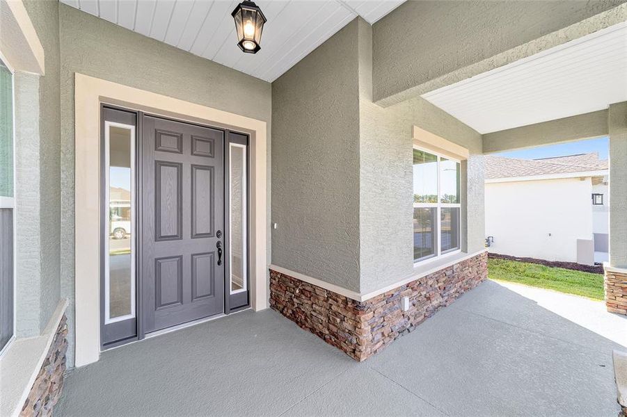 Exterior details and patio area of a home in On Top of the World Communities, Ocala (Image 29).