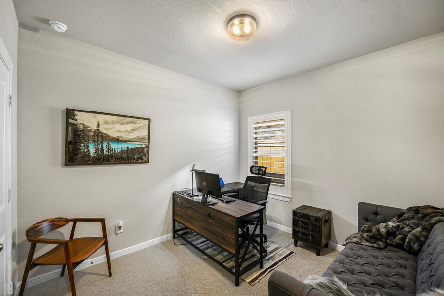 Furnished interior view inside a new home in The Highlands - Grove Collection, Porter (Image 9).