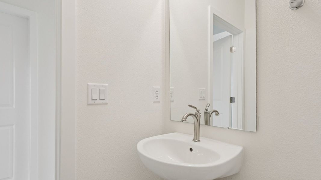 Half Bath in the Naples Floor Plan by DRB Homes Half Bath in the Naples Floor Plan by DRB Homes