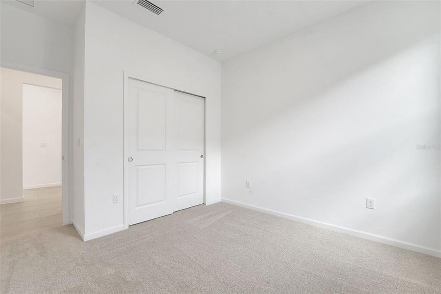 Spacious, unfurnished interior of a new home in Annabelle Estates, Winter Haven (Image 21).