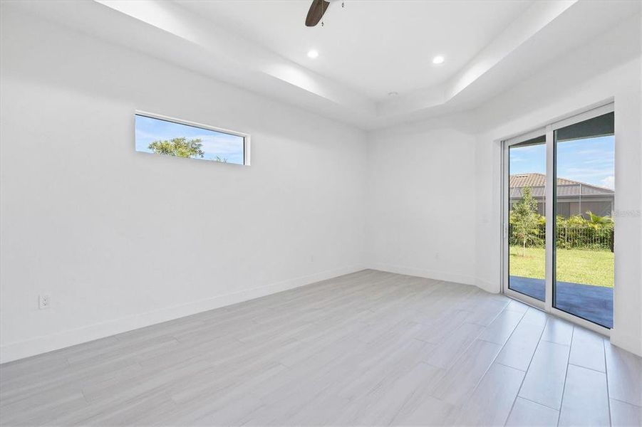 Spacious, unfurnished interior of a new home in , Port Charlotte (Image 13).