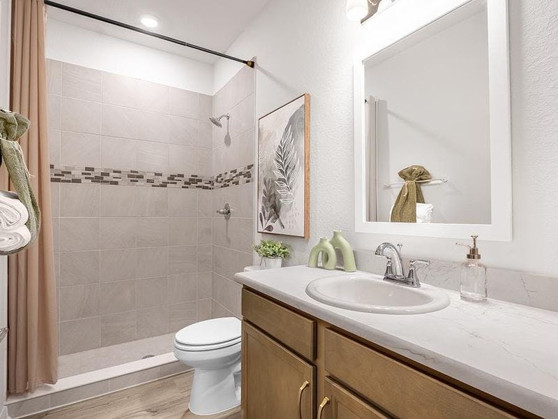 Bath 3 is located next to bedroom 3 - Monroe by Highland Homes