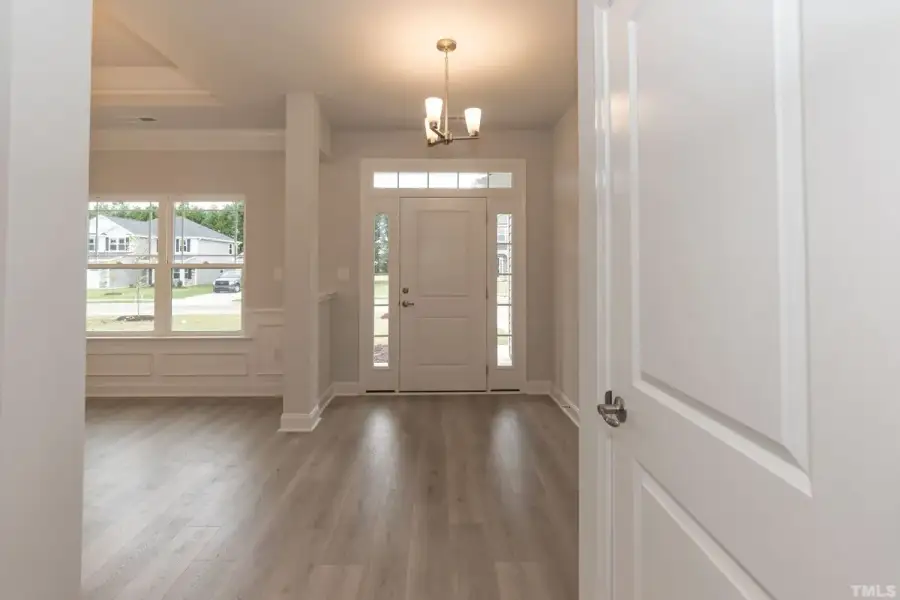 Spacious, unfurnished interior of a new home in East Lake, Leland (Image 11).
