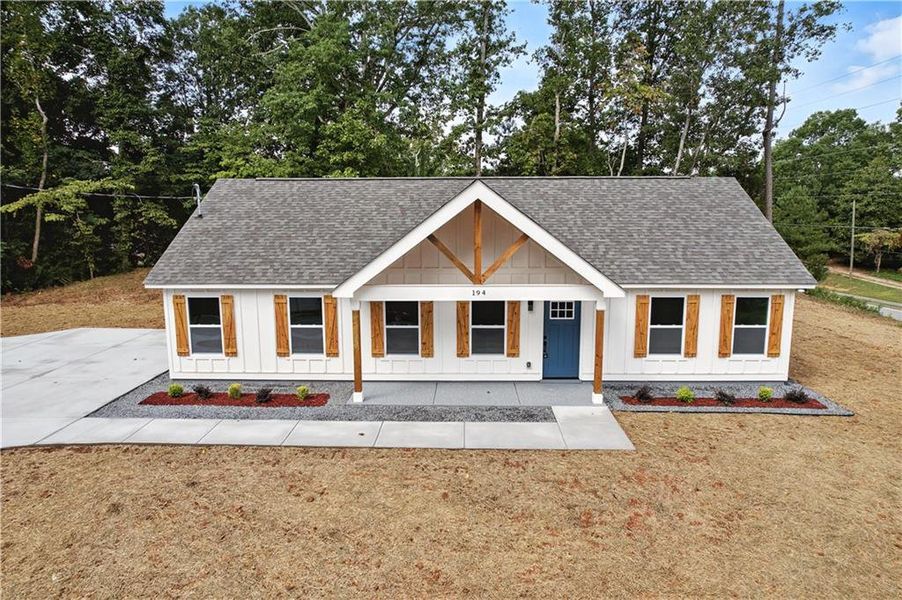 Front exterior of a new home in , Dallas, GA, highlighting curb appeal (Image 2).