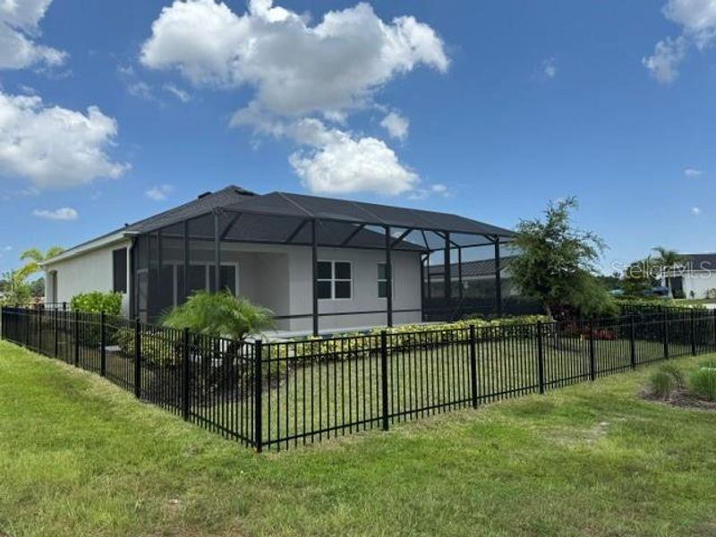 Exterior details and patio area of a home in The Willows, Parrish (Image 21).