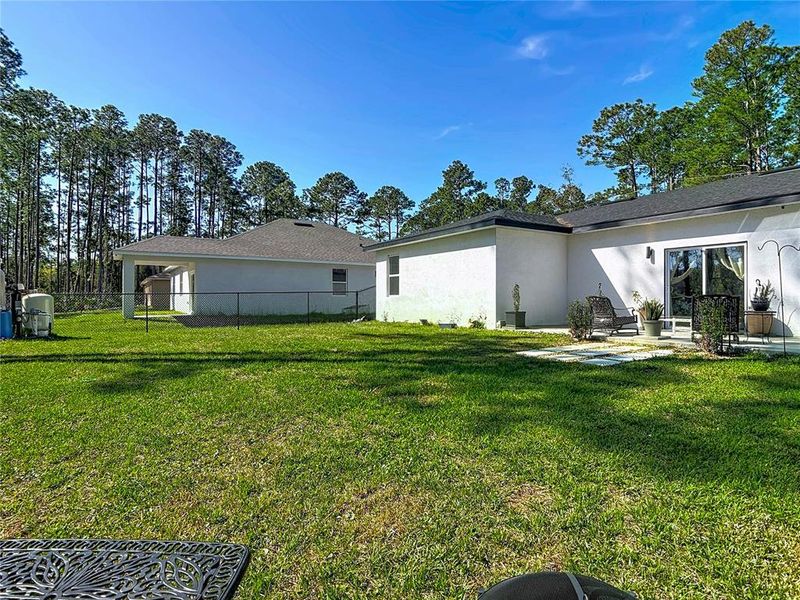 Exterior details and patio area of a home in , Deland (Image 25).