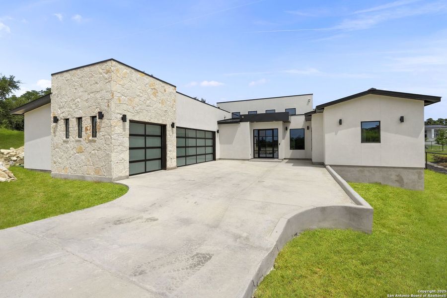 Front exterior of a new home in , San Antonio, TX, highlighting curb appeal (Image 23). Front exterior of a new home in , San Antonio, TX, highlighting curb appeal (Image 23).