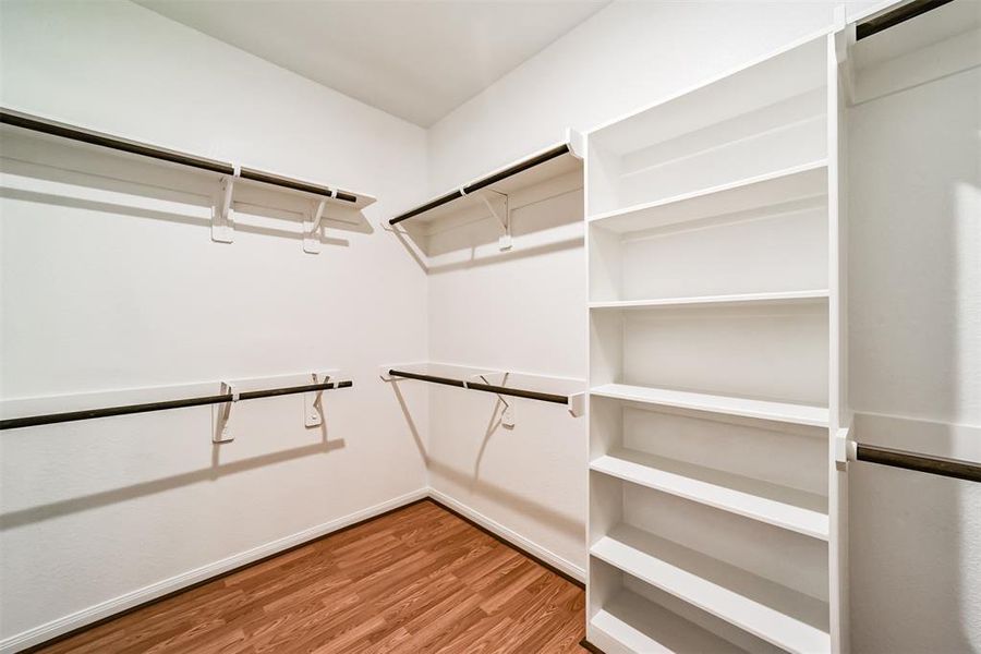 This spacious & well thought up designed walk in closet feature plenty of space for your collection of shoes, suits, or if we just need some extra storage tucked away.