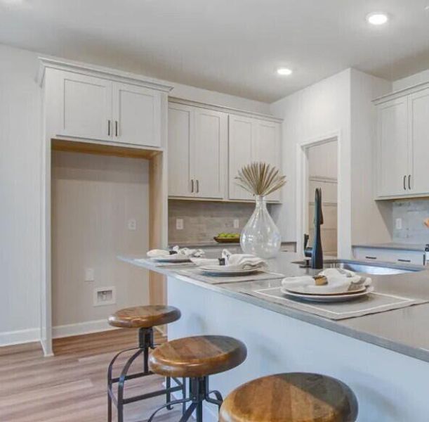 Furnished interior view inside a new home in Tea Farm: Presidents Series, Ravenel (Image 7).