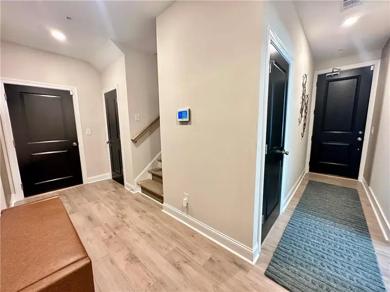 Spacious, unfurnished interior of a new home in Market Square at Sawnee Village, Cumming (Image 24).