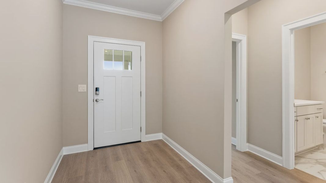 Spacious, unfurnished interior of a new home in The Courtyards at Bailey Farms, Dacula (Image 13).