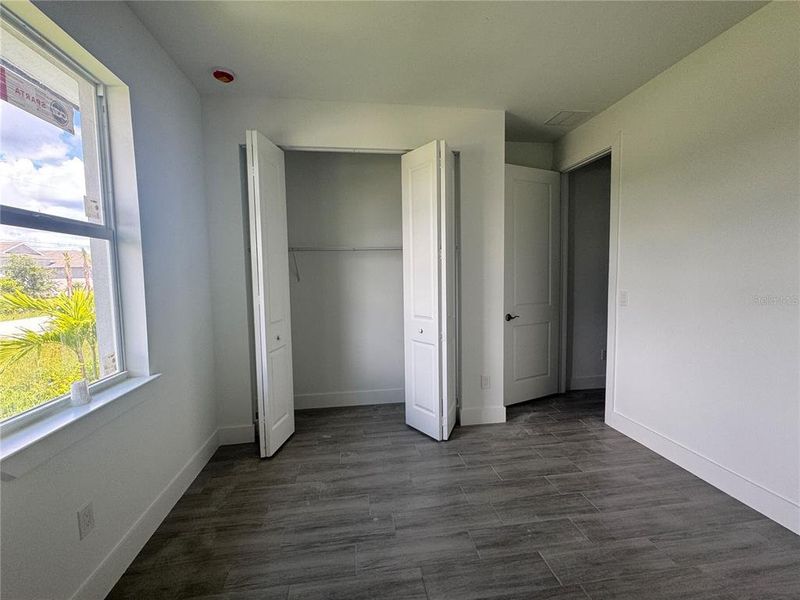 Spacious, unfurnished interior of a new home in , Port Charlotte (Image 27).