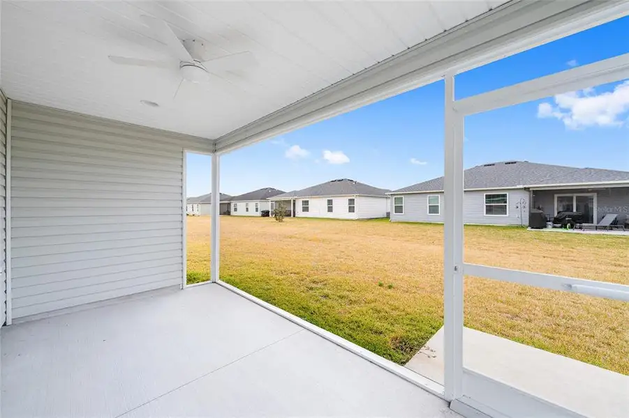 Exterior details and patio area of a home in , The Villages (Image 19). Exterior details and patio area of a home in , The Villages (Image 19).