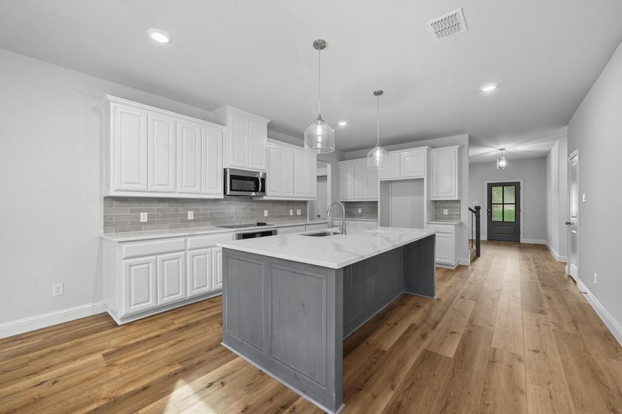 Representative furnished interior of a home built from the Garrison III by Cheldan Homes in Arbor Oaks, Boyd (Image 10).