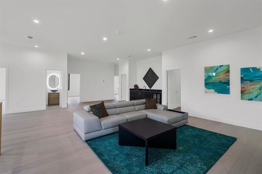 Living room with hardwood / wood-style floors