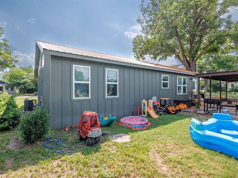 Exterior details and patio area of a home in , Brownwood (Image 26).