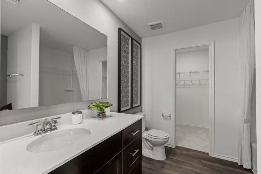 Photo of Pulte model home with same floor plan, not of actual home listed. Photo of Pulte model home with same floor plan, not of actual home listed.