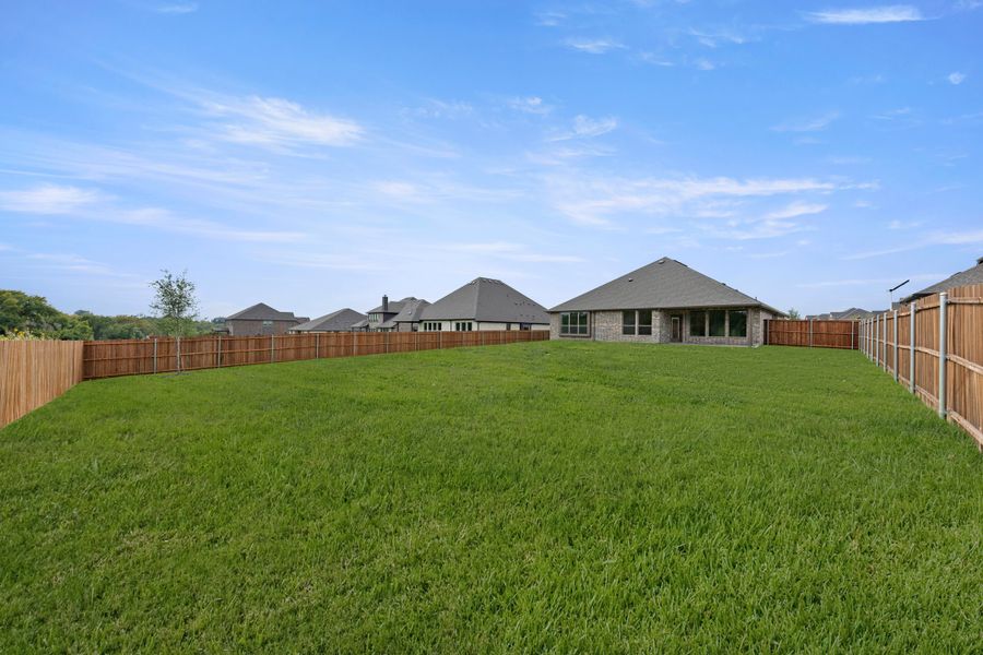 Exterior details and patio area of a home in Lovers Landing, Forney (Image 18).