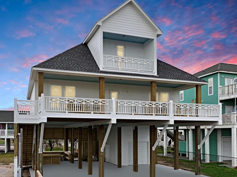 Front exterior of a new home in , Bolivar Peninsula, TX, highlighting curb appeal (Image 30). Front exterior of a new home in , Bolivar Peninsula, TX, highlighting curb appeal (Image 30).