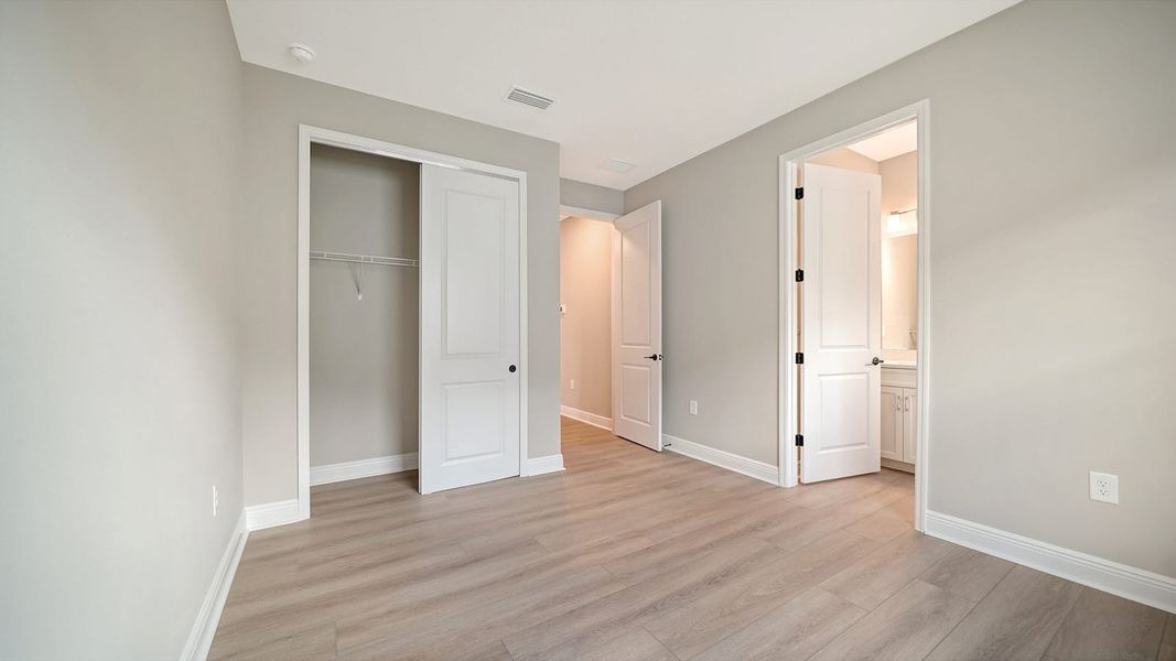 Spacious, unfurnished interior of a new home in Windward Real Estate and Homes for Sale in Sarasota, FL - Neal Communities, Lakewood Ranch (Image 44).