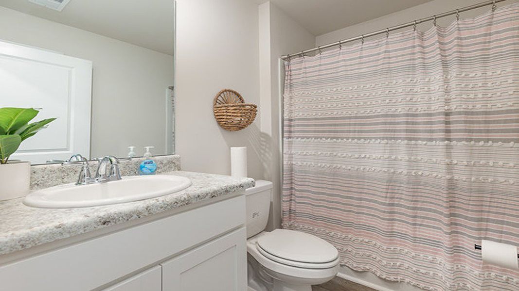 Representative furnished interior of a home built from the ARIA by D.R. Horton in Cottonwood Place, Tabor City (Image 6).