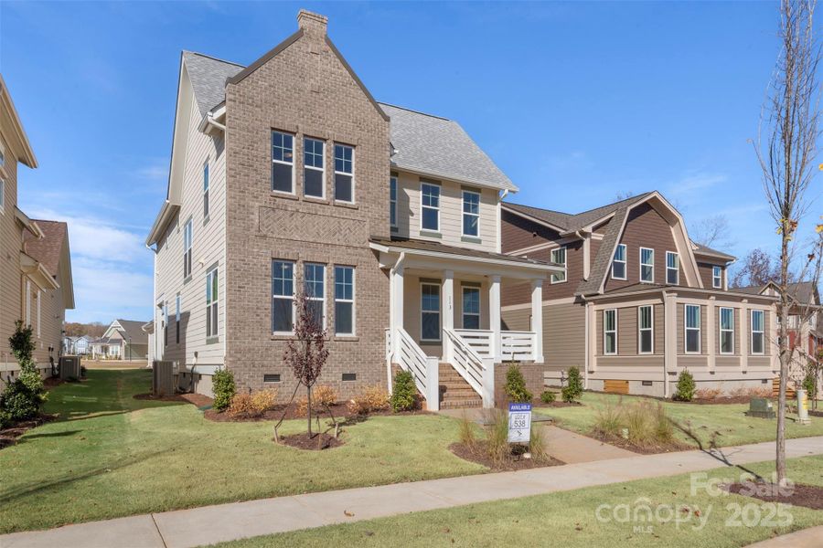 Front exterior of a new home in Riverwalk, Rock Hill, SC, highlighting curb appeal (Image 2).