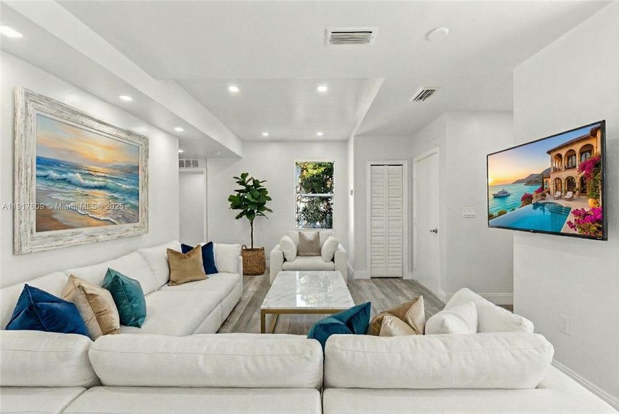 Virtually staged lving room of 5820 NW 3rd Ave, which currently has no furniture..just appliances Virtually staged lving room of 5820 NW 3rd Ave, which currently has no furniture..just appliances