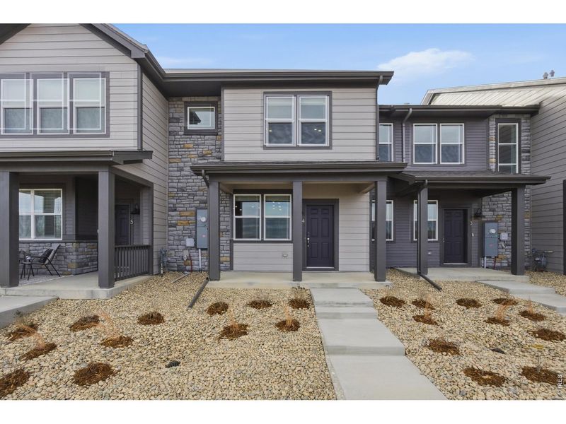 Exterior details and patio area of a home in Poudre Heights: The Meadow Collection, Windsor (Image 3).