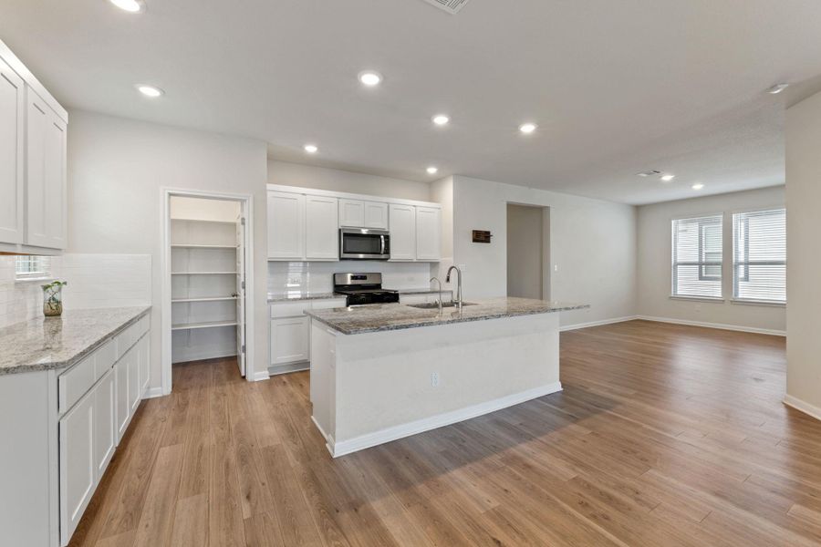 Furnished interior view inside a new home in The Ridge at Trinity Ranch, Elgin (Image 11). Furnished interior view inside a new home in The Ridge at Trinity Ranch, Elgin (Image 11).